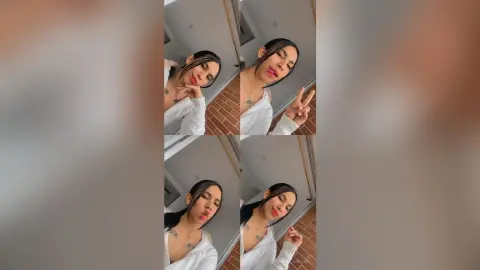 Playful young woman in a white long-sleeve shirt making funny faces in a mirror selfie.