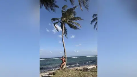 Miah — Palm trees and a pretty girl