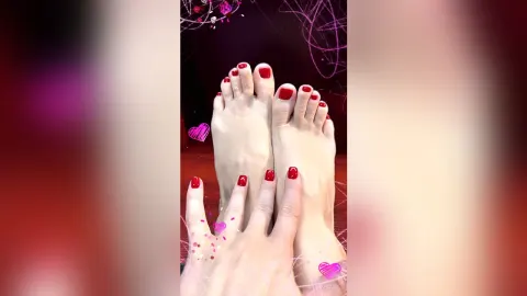 DianKrouse — DianKrouse shows off her bare feet and toes with bright red nail polish.