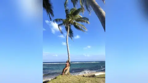 Miah — Palm trees and a pretty girl