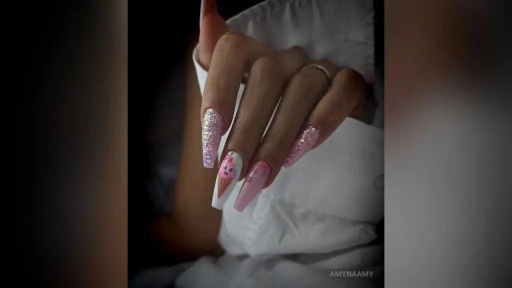 Nude woman lying on a white faux fur rug in a cozy, warm-lit bedroom setting.