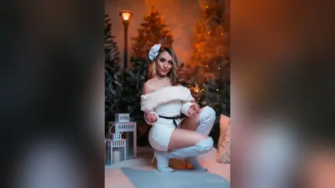 Glamorous woman in a white faux fur outfit posing in a dreamy winter wonderland forest setting.