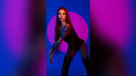 EveLux — Redhead in blue light💦