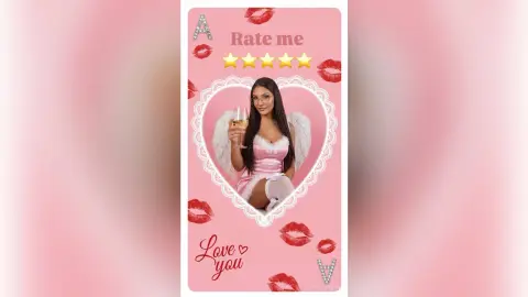 Beautiful woman in pink angel costume holding champagne in a romantic pink heart-themed setting.