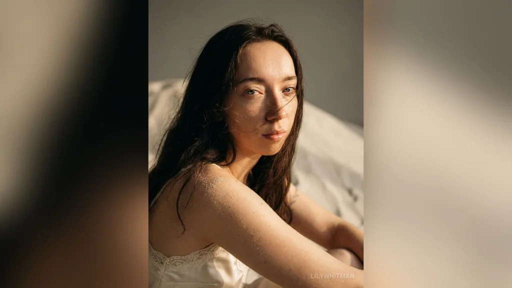 LilyWhitman — Between Light and Shadow
