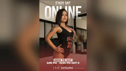 Tattooed woman in a black Bulls tank top posing in a modern room for a live online stream.