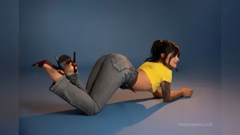 Woman in yellow top and blue jeans lying on a blue studio background in a playful pose.