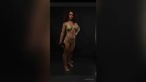 Athletic woman in a lime green bikini posing confidently in a dark fitness studio setting.