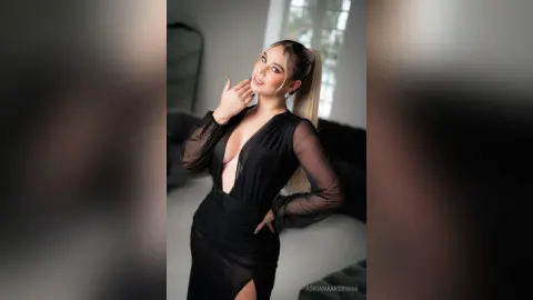 AdrianaAkerman — black dress, long legs