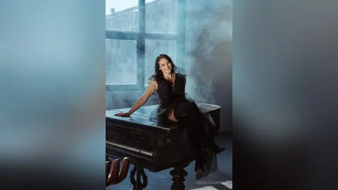 AngelinaKunis — Back to Black