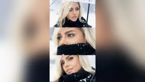 Blonde woman in a cozy black knit sweater smiling in a snowy winter landscape.