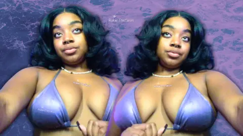Young woman in a purple bikini top posing against a dreamy blue background with a serene mood.