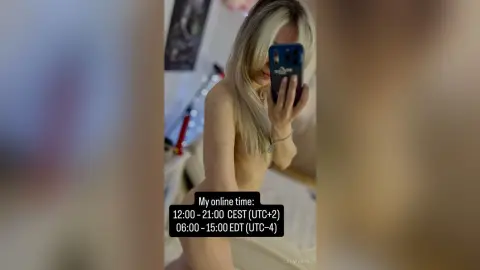 LeyaTaryn takes a naked mirror selfie, showing her long blonde hair and bare body in a bedroom setting.