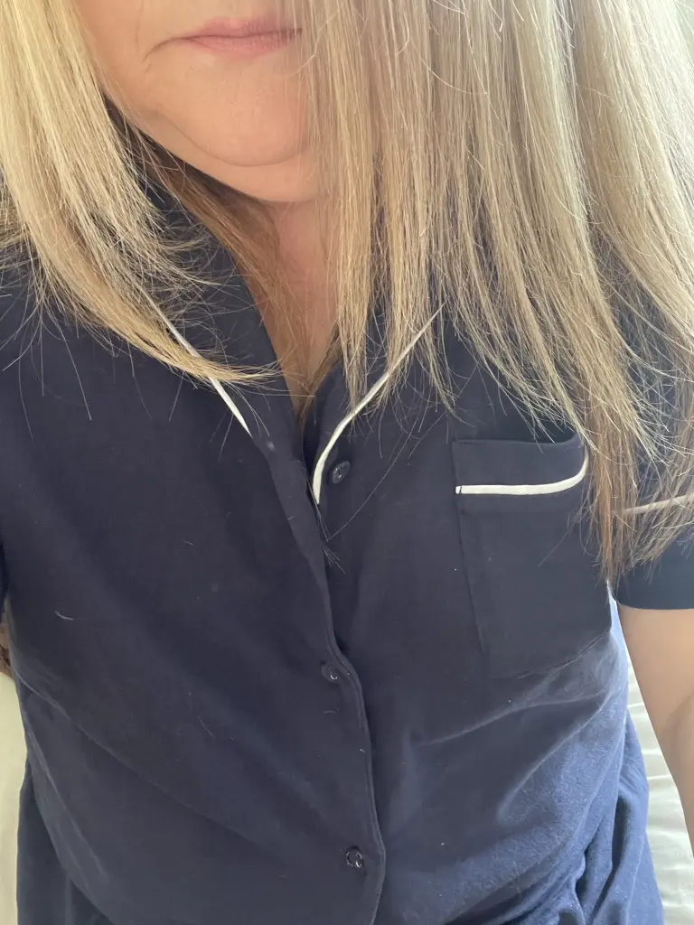 SexyLexiexox looks into the camera with her eyes, showing her light-colored eyes and blonde hair.