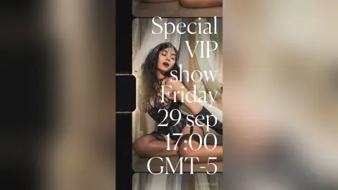 Glamorous woman in black lace lingerie posing in a dreamy indoor setting for a special VIP show.