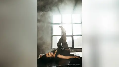 AngelinaKunis — Back to Black