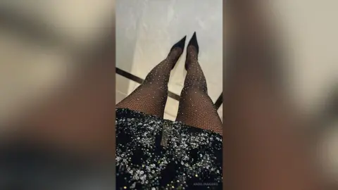 AngelinaKunis — Lady in black