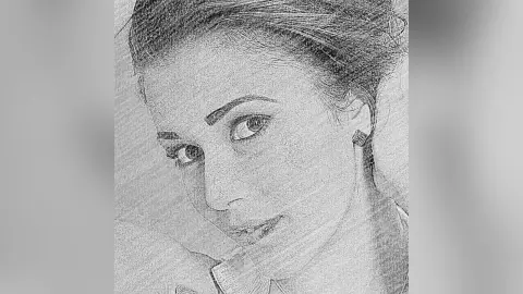 MontseFerrera looks directly at the camera with a close-up view of her face and eyes.