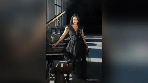 AngelinaKunis — Back to Black