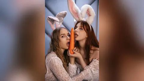 StellaFletcher wears white lace and bunny ears while licking a whole carrot.