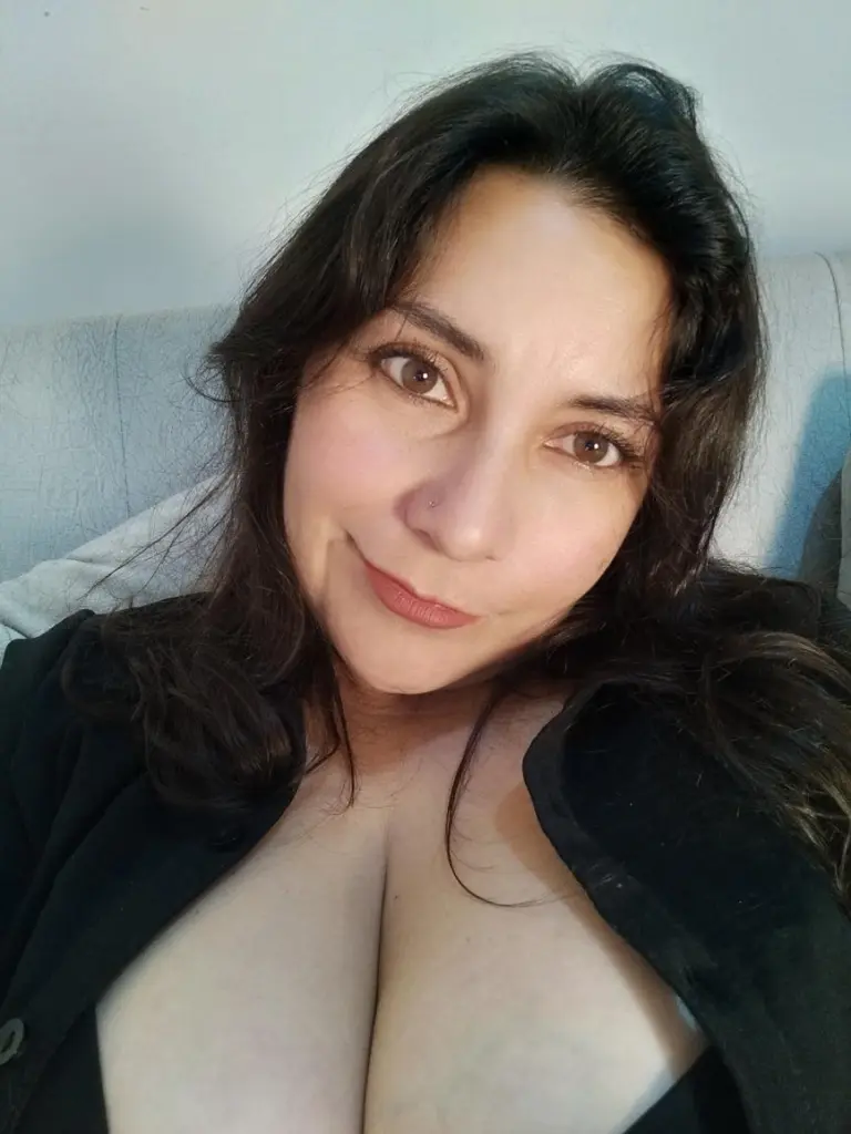 Vanebrown87 looks into the camera with a slight smile in this close-up selfie.