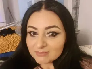 Adoreme96 poses for a close-up selfie, showing her dark hair and heavy eye makeup with winged eyeliner.