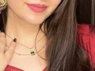 LovleyDeepika4 shows her face and long dark hair, wearing a thin gold necklace against her skin.