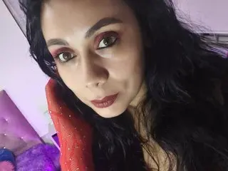 Nyra_Rose poses with a close-up selfie, showing her face, dark hair, and red eye makeup.