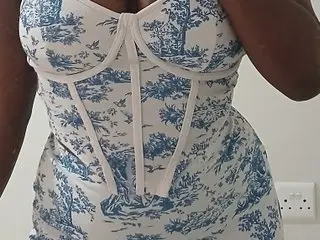 Tracey2000 poses in a tight white and blue floral print sundress.