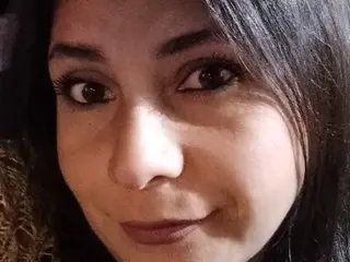 Vanebrown87 looks into the camera with a slight smile in this close-up selfie.