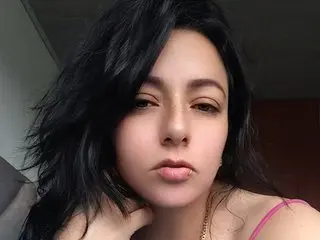 scarlett40 with long black hair, looking directly at the camera with a neutral expression.